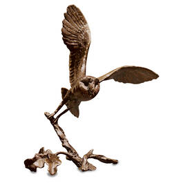 taking off bronze barn owl UK TOBBO a main